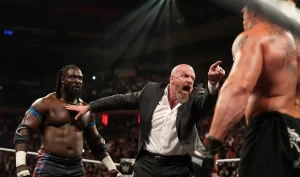 fans-disappointed-as-triple-h-stops-brock-lesnar-oba-femi-brawl-on-wwe-raw